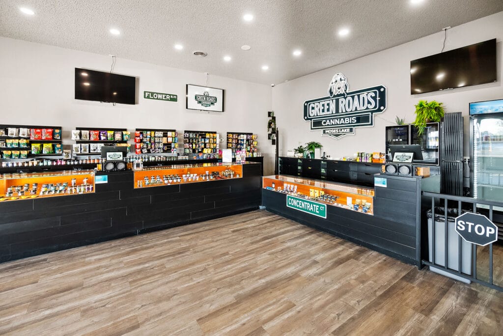 Cannabis dispensary interior with products on display.