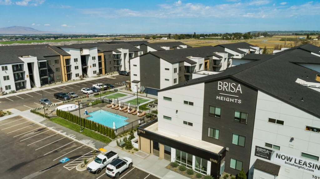 Brisa Heights apartments with pool and parking lot.