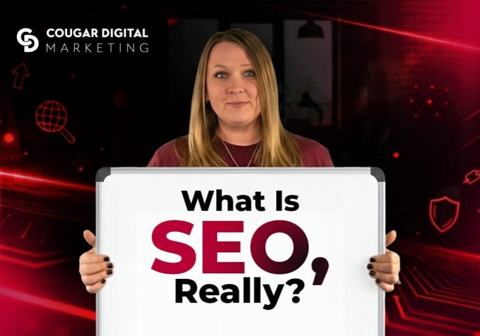 Person holding SEO sign with digital background