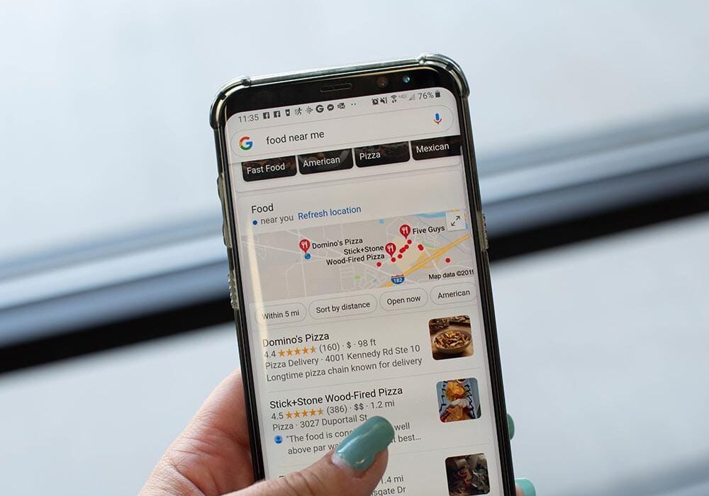 website-google-search-results Smartphone showing Google Maps food search results.